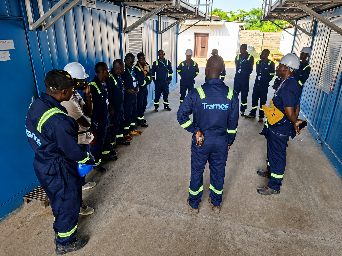 Tramos Group engineers collaborating over industrial plans at a project site